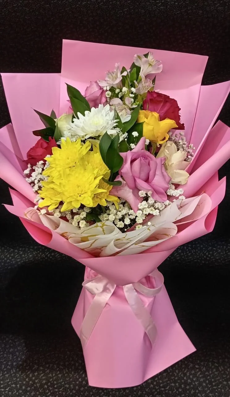 Pink carnival bouquet with yellow, white, pink and purple flowers