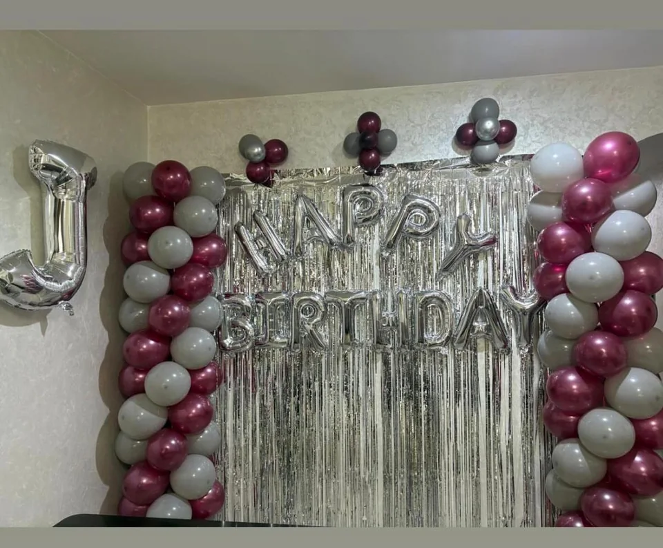 Silver and burgundy balloon birthday backdrop with Happy Birthday lettering